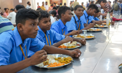 Children eating midday meal